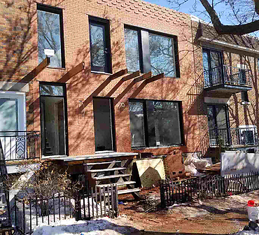 Reparation de ventre de boeuf a Montreal - Démolition de mur de maçonnerie, réparation de ventre de boeuf à Montréal, quartier Rosemont.